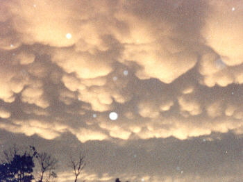 Possible Mammatus clouds - the under side of the anvil of a thunderhead